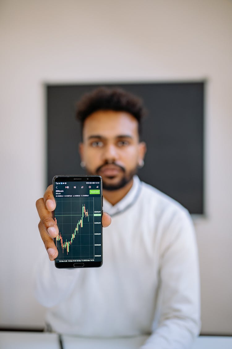 Man Holding A Smartphone