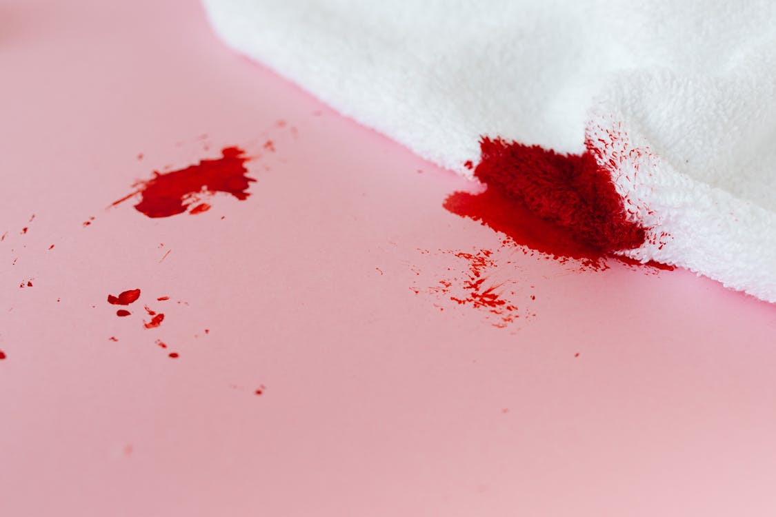 Free White Textile With Red Stain Stock Photo