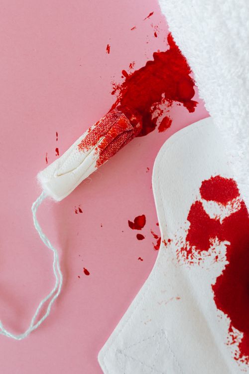 Free Colorful image depicting the real-life use of menstrual products, highlighting period positivity. Stock Photo