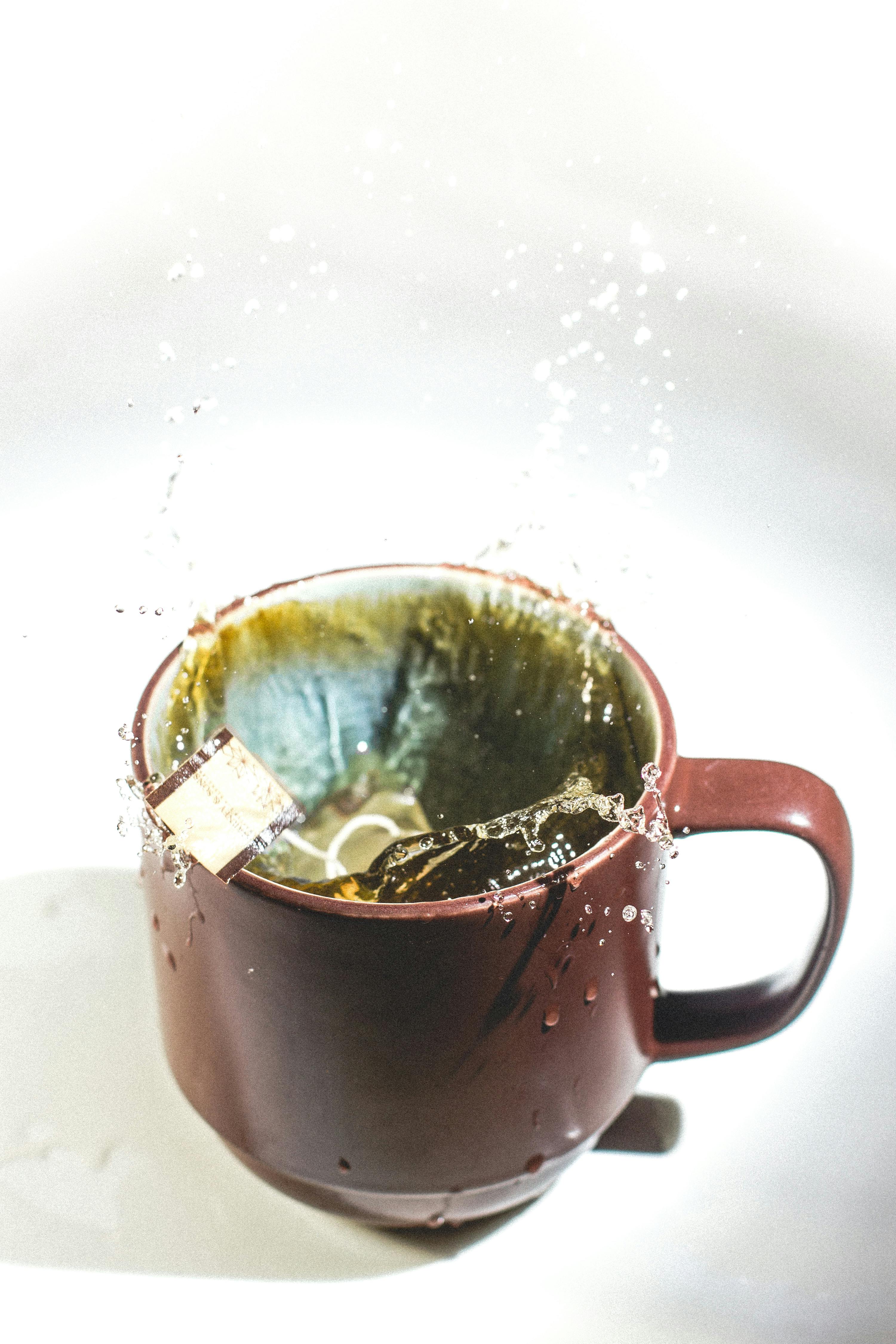 Brown Ceramic Mug on Focus Photo