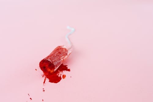 Close-up Shot of a Tampon with Blood