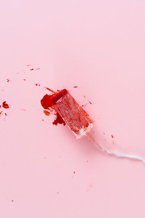 Flatlay of a Tampon with Blood