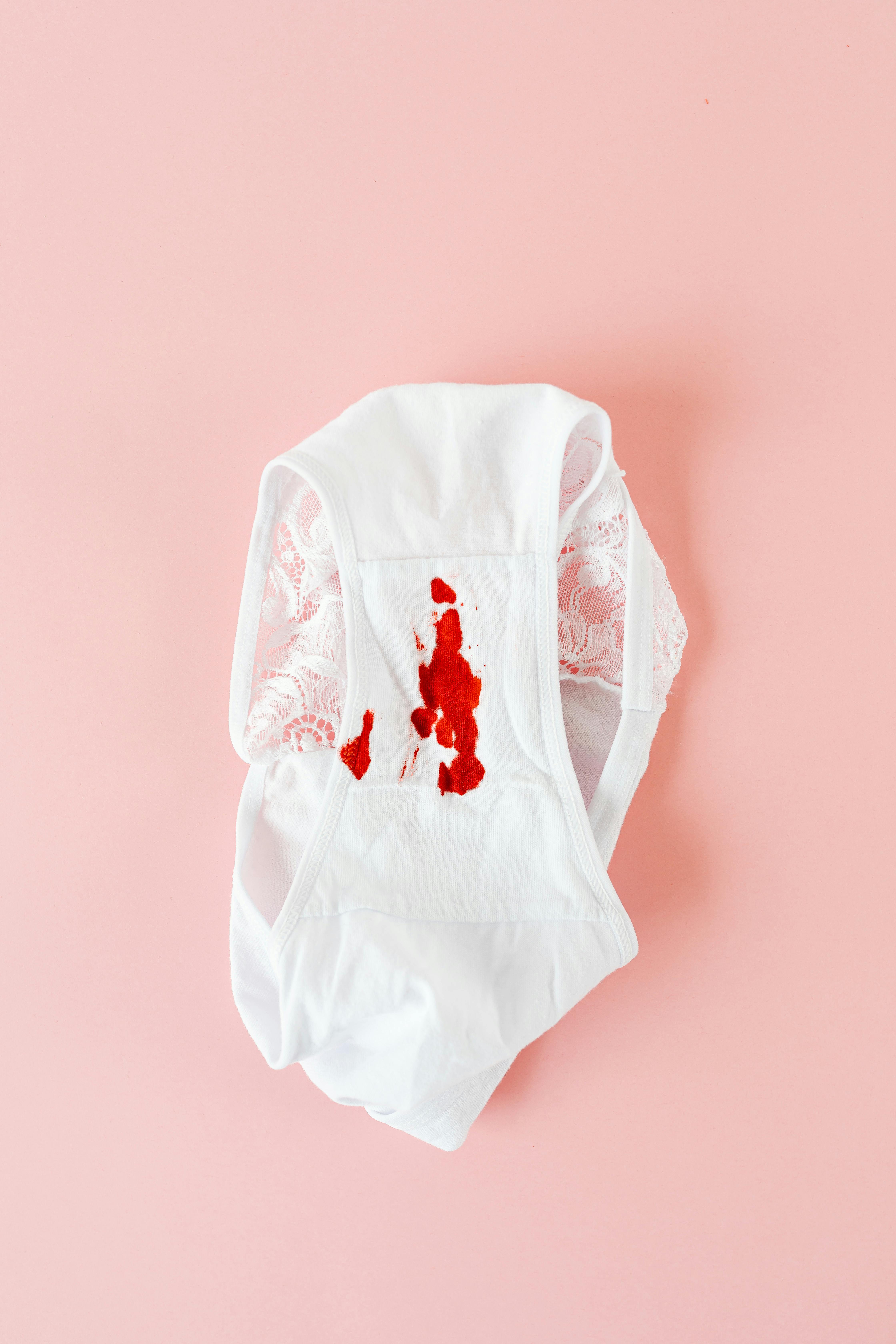 Woman With Panties With Period Blood Censored. Stock Photo, Picture and  Royalty Free Image. Image 141847760.