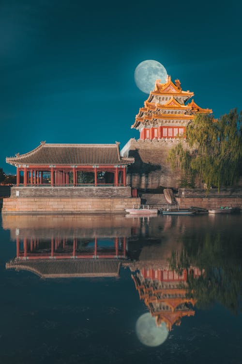 Moon Reflection in Pond by Forbidden City at Night