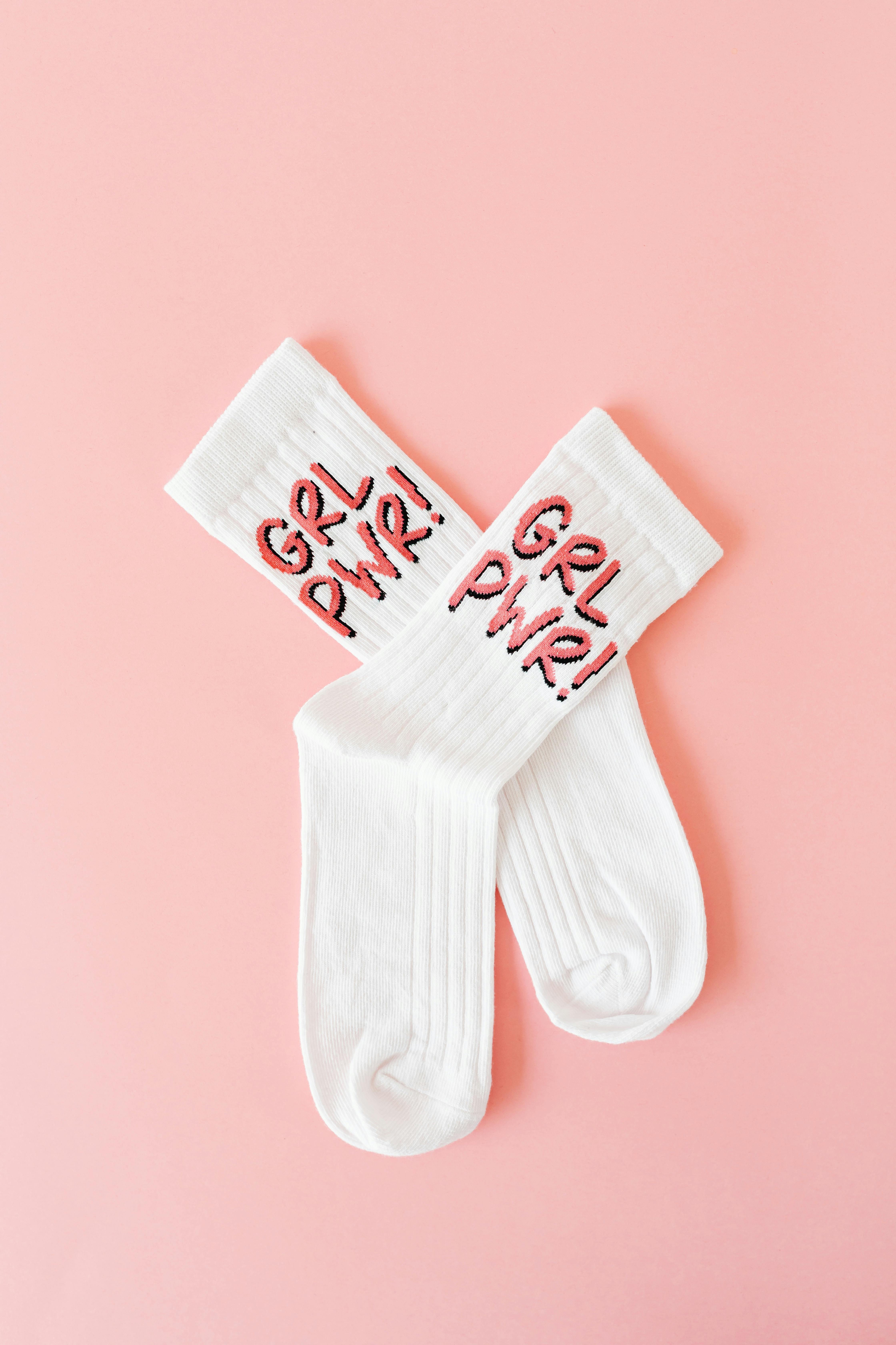 photo of socks on pink surface