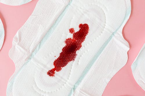 Close-up Shot of a Menstrual Pad with Blood