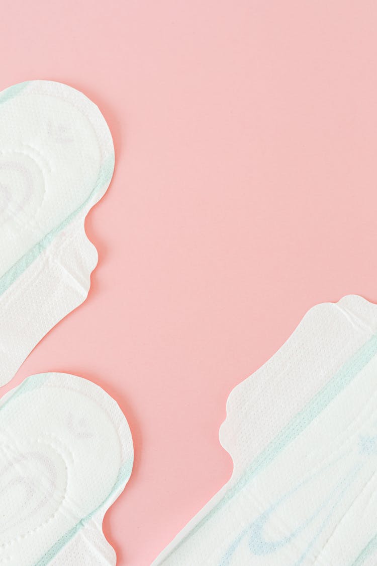 Sanitary Napkins On Pink Background