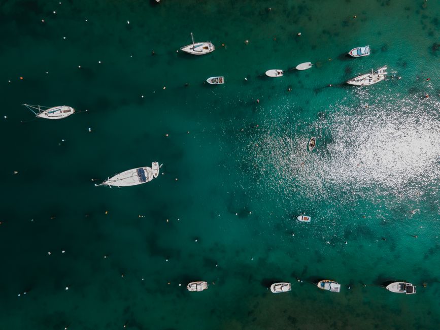 Breathtaking Private Day Charter on Amazing Mowgli Review: Your Ultimate Malta Yacht Experience Review 2026 - Aerial view of boats moored on the emerald waters of Kalkara Harbor, Malta.
