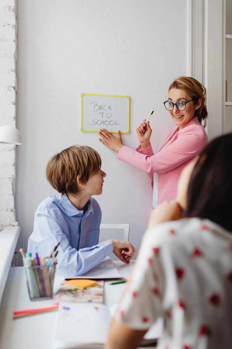 A Woman Teaching Her Students