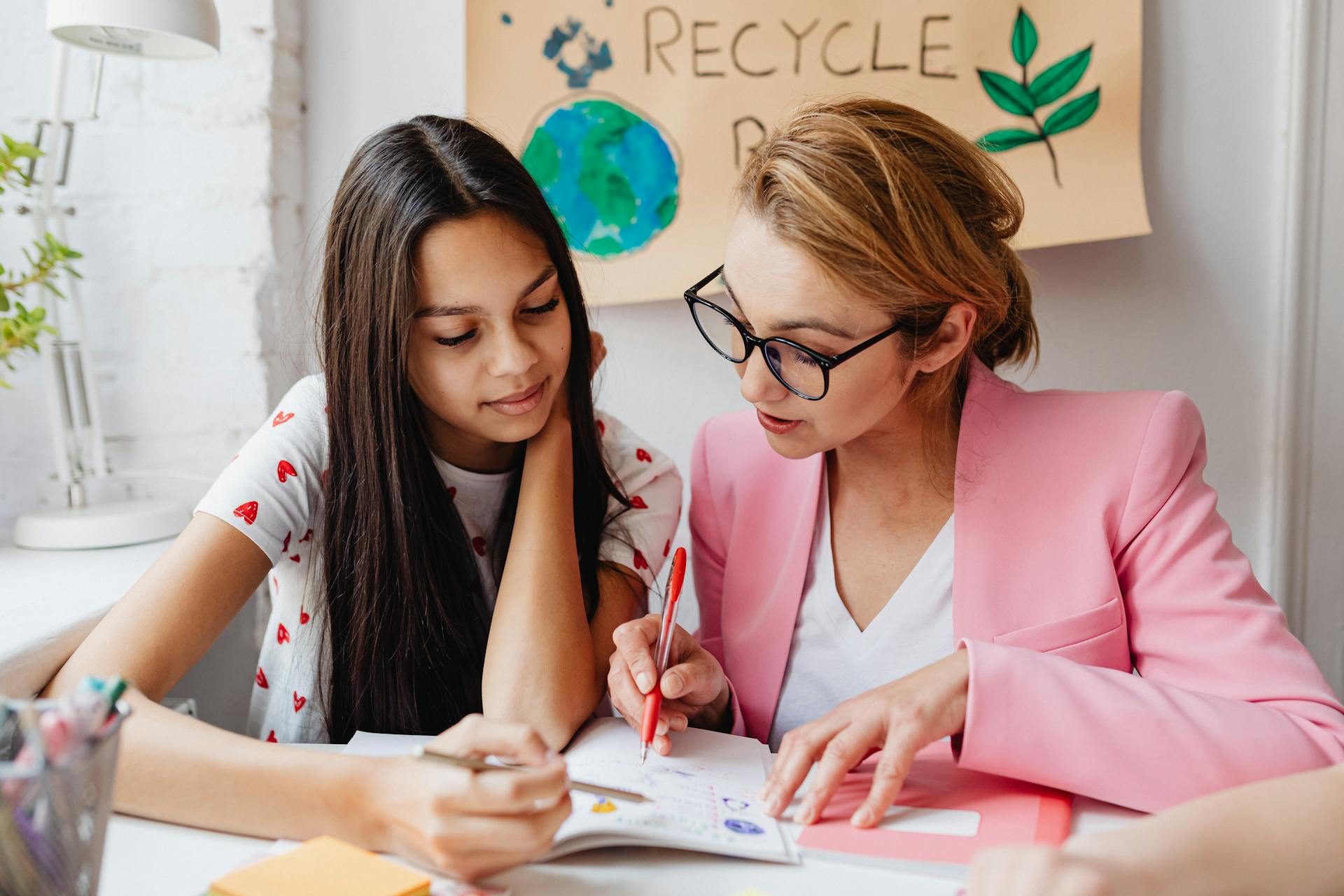 Woman Teaching a Girl