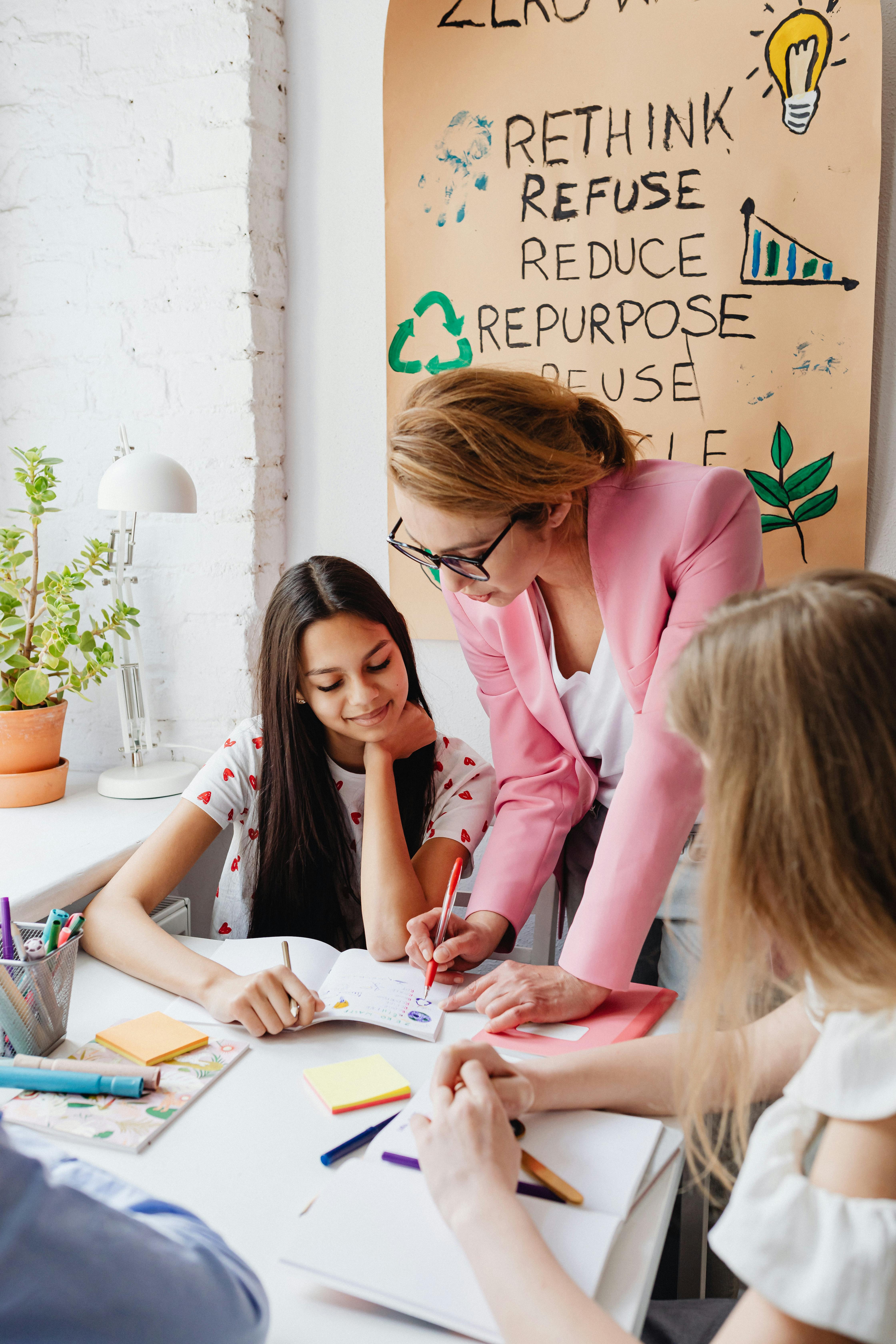 a woman teaching her students