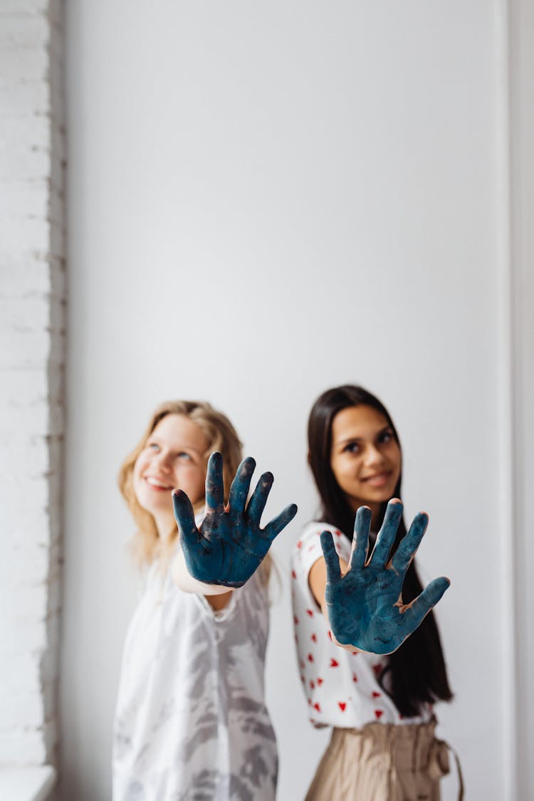 Young Women With Dirty Hands