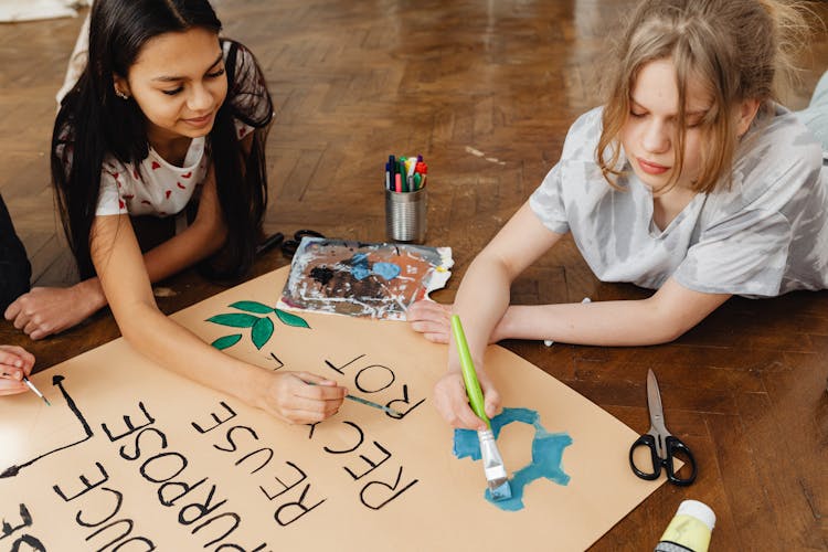 Girls Making A School Project