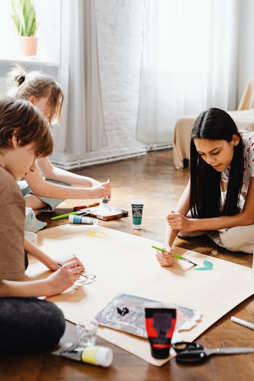 Friends Painting on the Floor