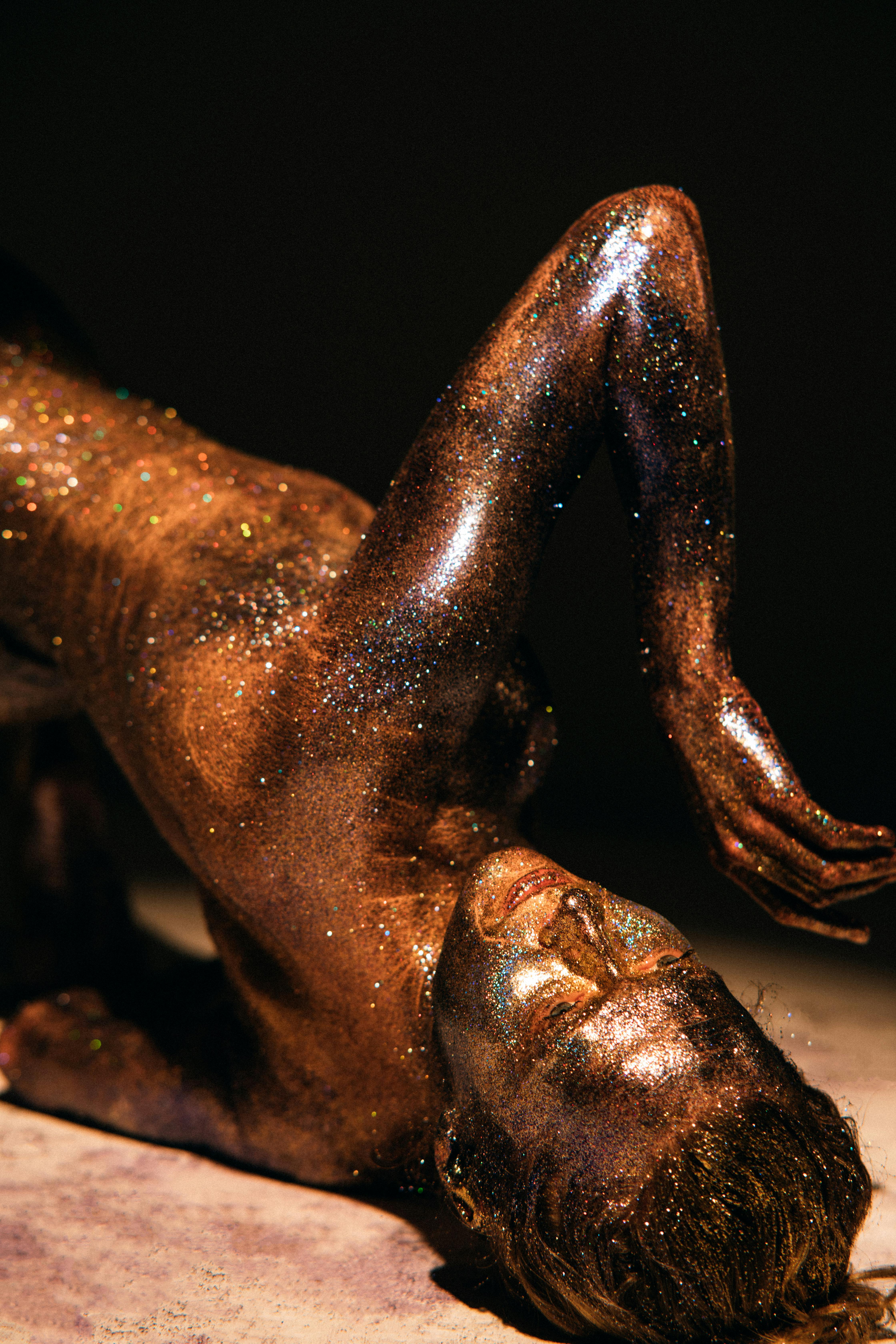 man in glittery body art expressionism