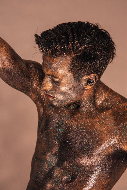 A Man with Shimmering Body Paint