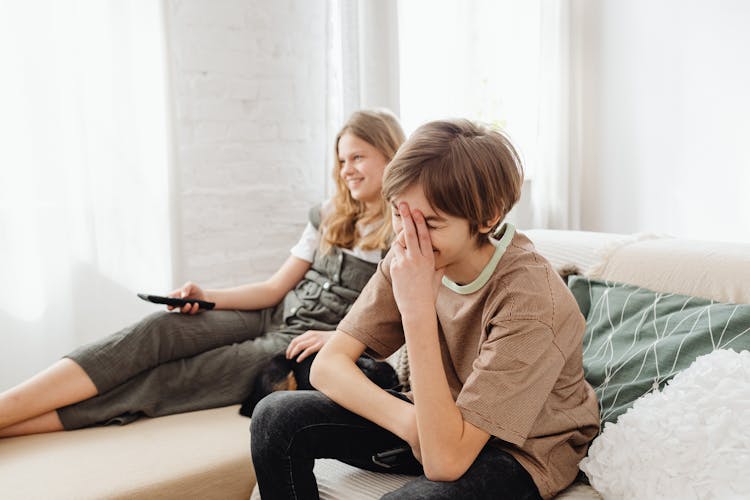 Kids Sitting On A Couch