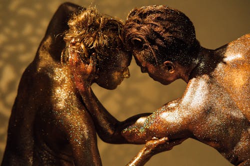 Models Covered in Shimmering Body Paint