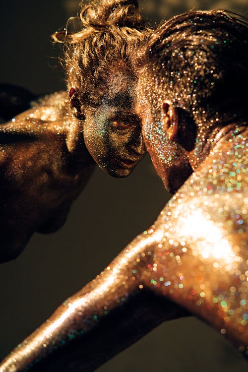 A Man and a Woman Filled with Glitters Dancing