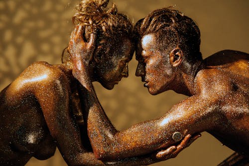 Models Posing as Bronze Statue