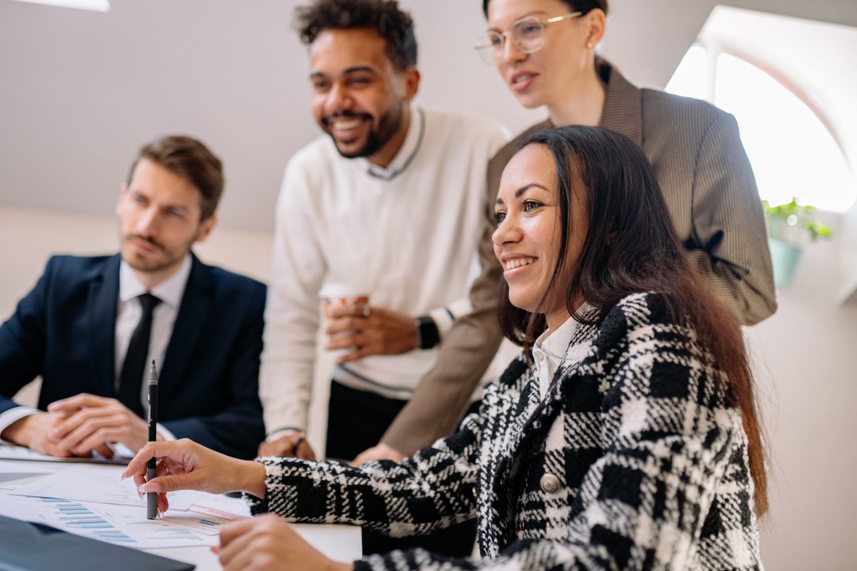 A group of professionals engaged in a collaborative business meeting