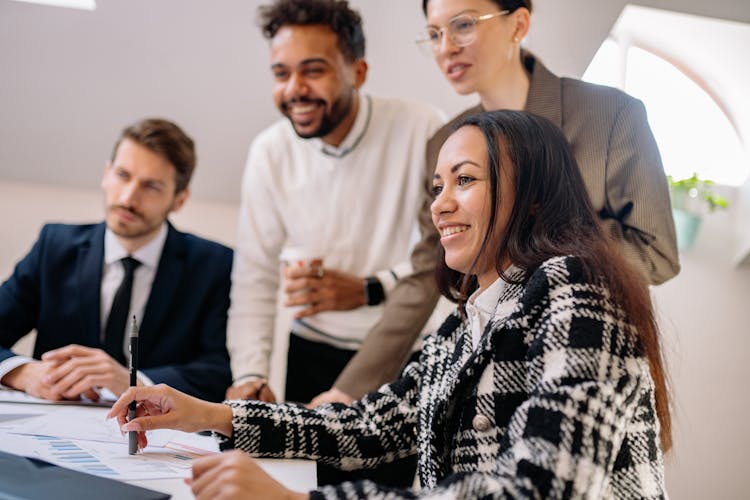 Businesspeople Wearing Happy Smiles In A Meeting