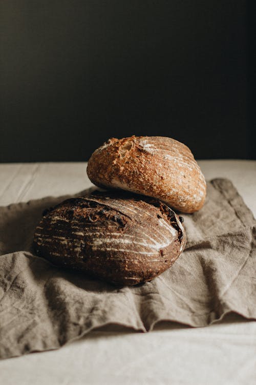Free Loaves of bread on napkin Stock Photo