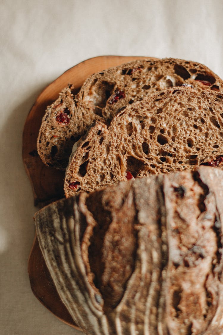 Cut Loaf Of Cranberry Bread On Table