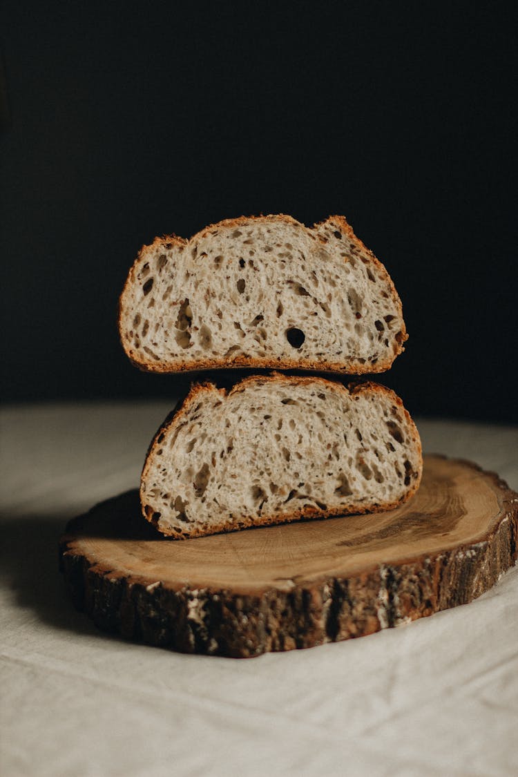 Tasty Bread On Wooden Cutting Board