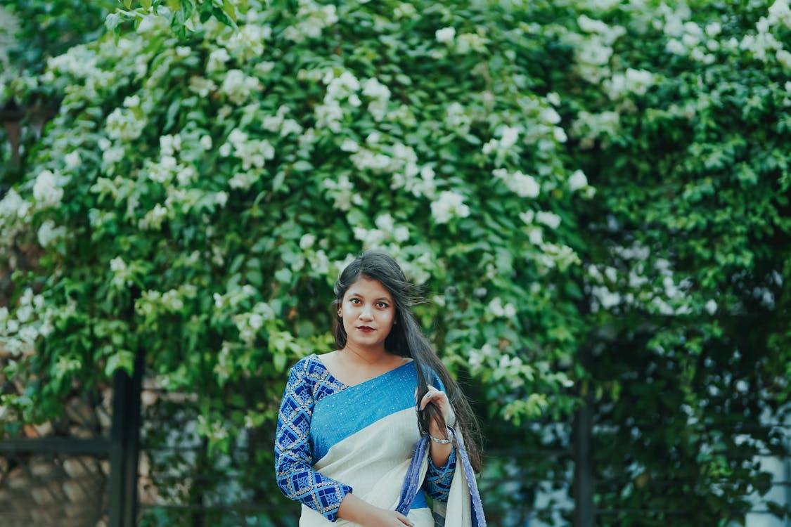 A Woman Posing in a Sari