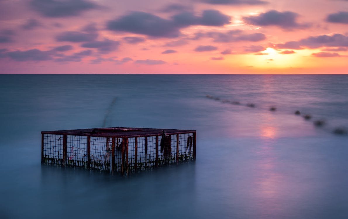 Metal Cage on Water