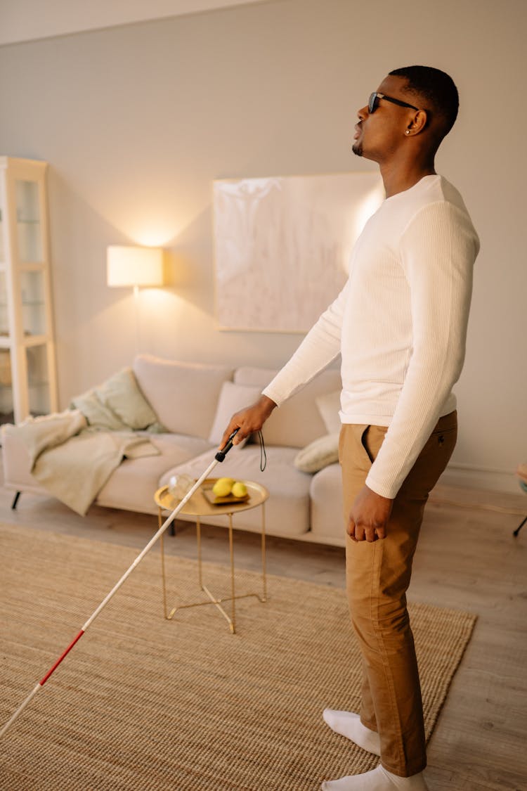 Blind Man Walking Using Crane 