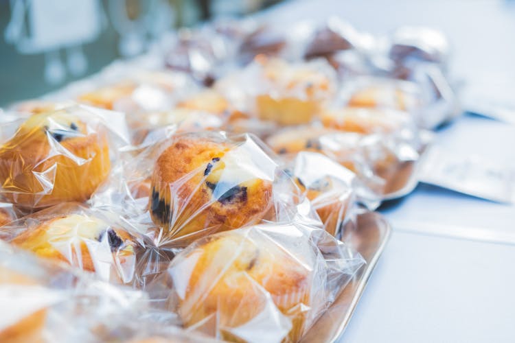 Blueberry Muffins In Plastic Wrapping