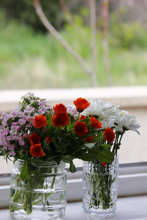 Close up of Flowers in Vases