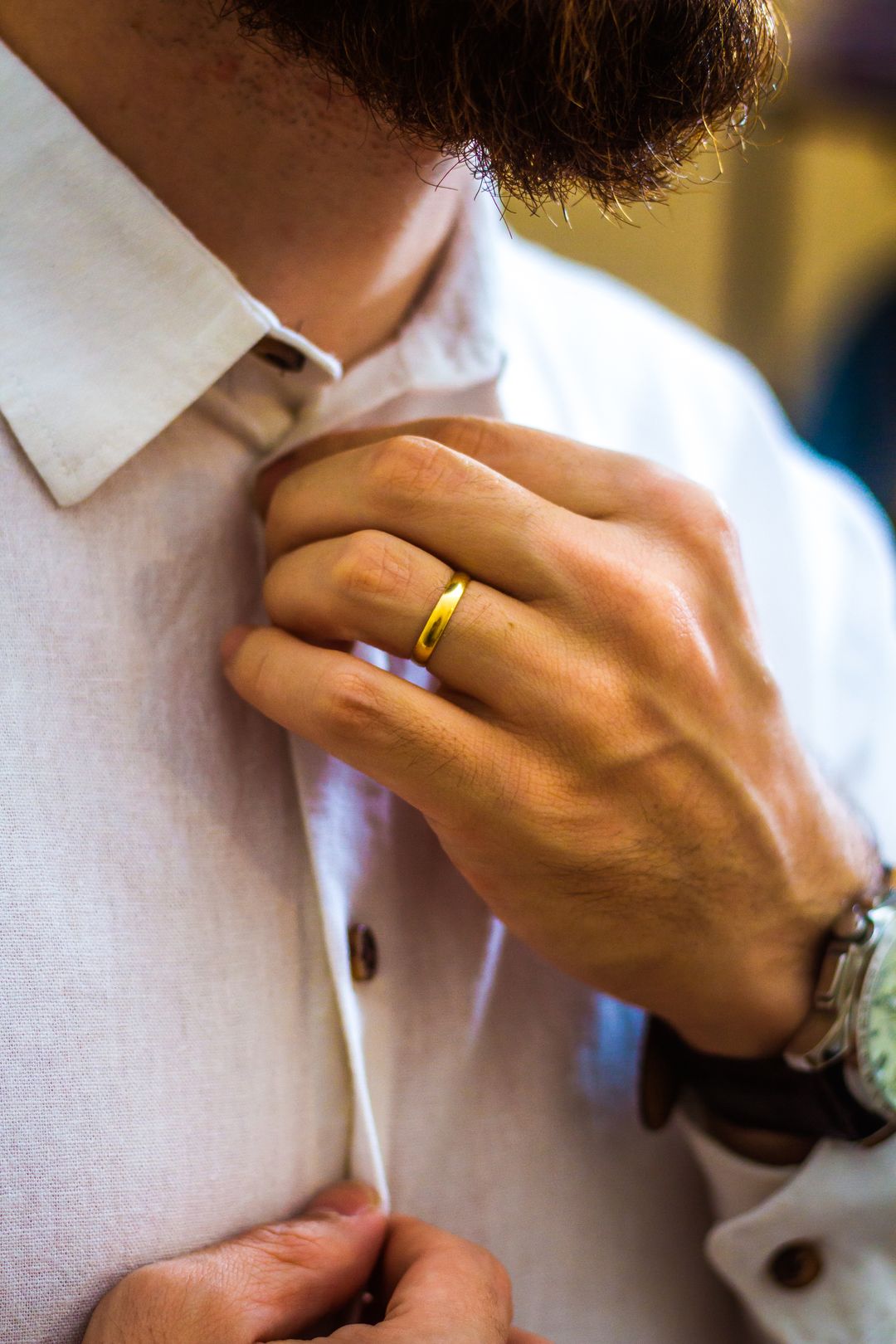 rose gold wedding bands for men close-up on dark surface — FoundryCut