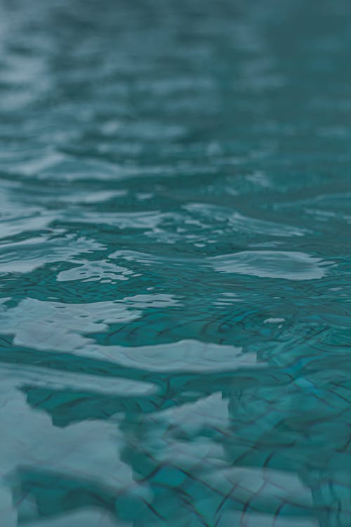 Close-up of Calm Water Surface in Pool