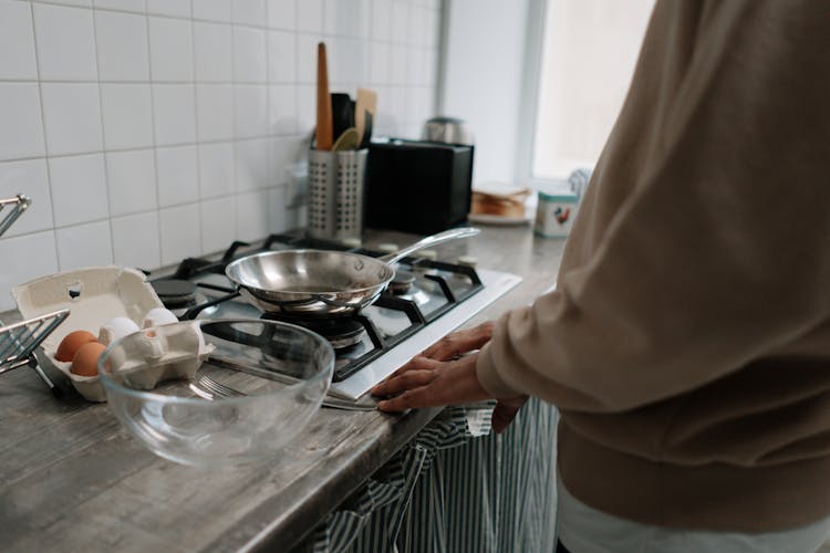 Person Cooking Breakfast