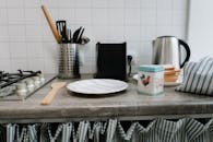 White Ceramic Plate on Brown Wooden Table