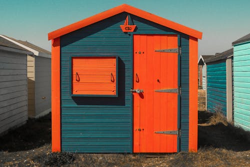 Безкоштовне стокове фото на тему «апельсин, дерев'яний будинок, дизайн»