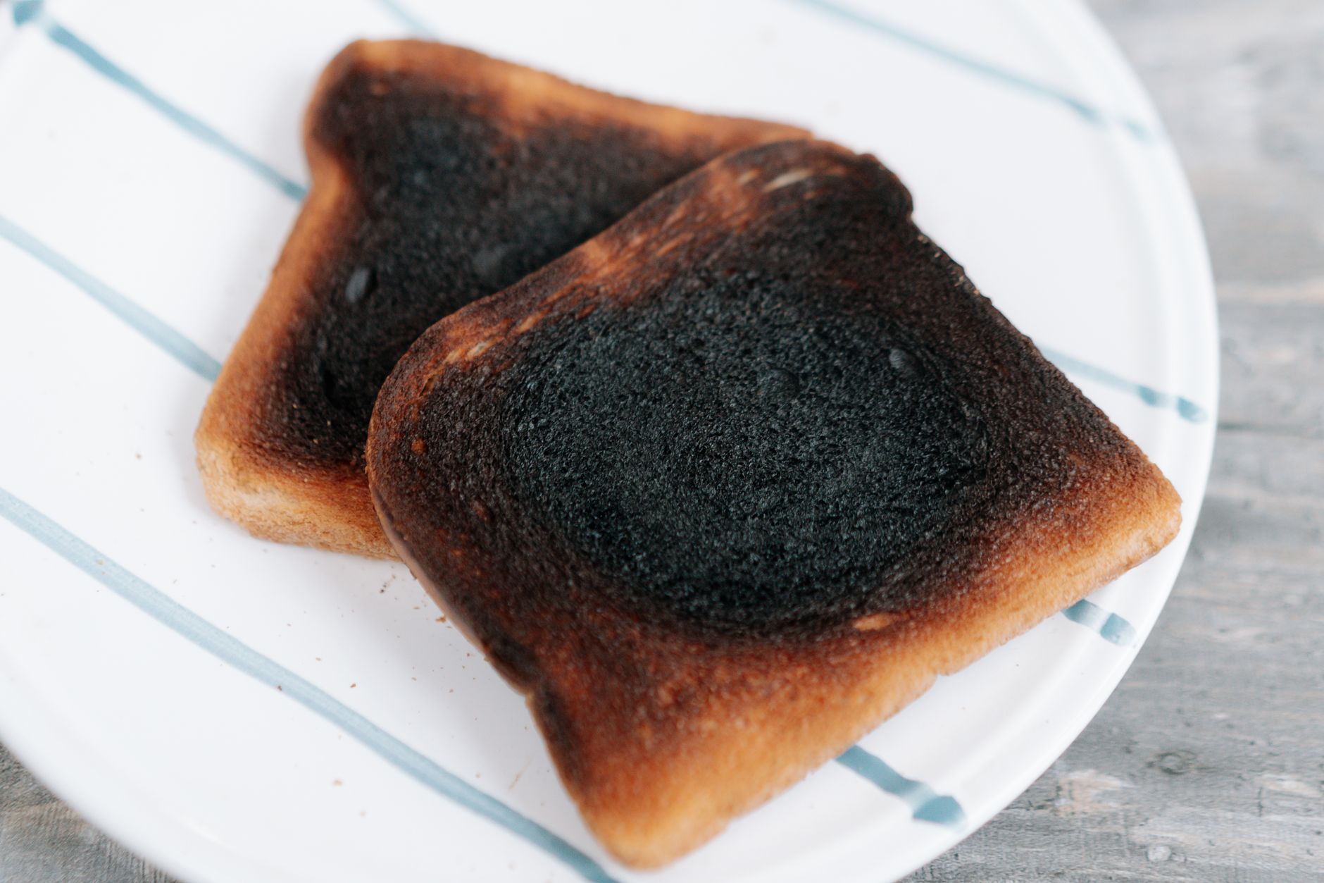 Loaf of halal-certified bread with toaster and a knife on kitchen table