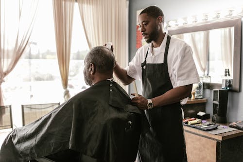 A Man Getting a Haircut