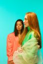 Woman in Green Long Sleeve Shirt Holding Woman in Green Long Sleeve Shirt