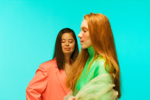 Female Models Posing Together in Trendy Outfits