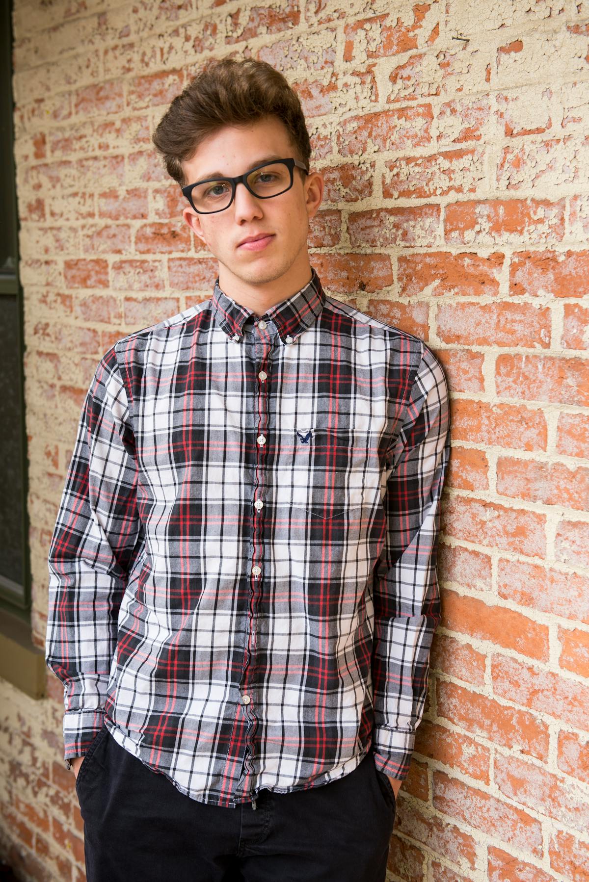 Person using a smartphone to browse a music streaming app