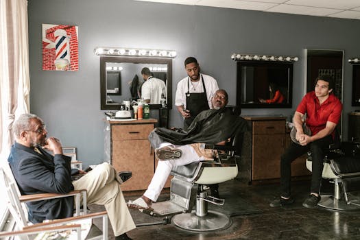 A stylish barber shop with clients and a barber in a relaxed setting, showcasing a classic grooming experience.
