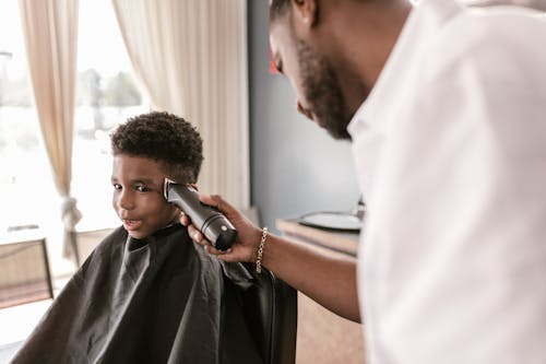 Free Boy Getting a Haircut Stock Photo