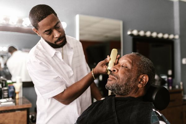 Barber styling client