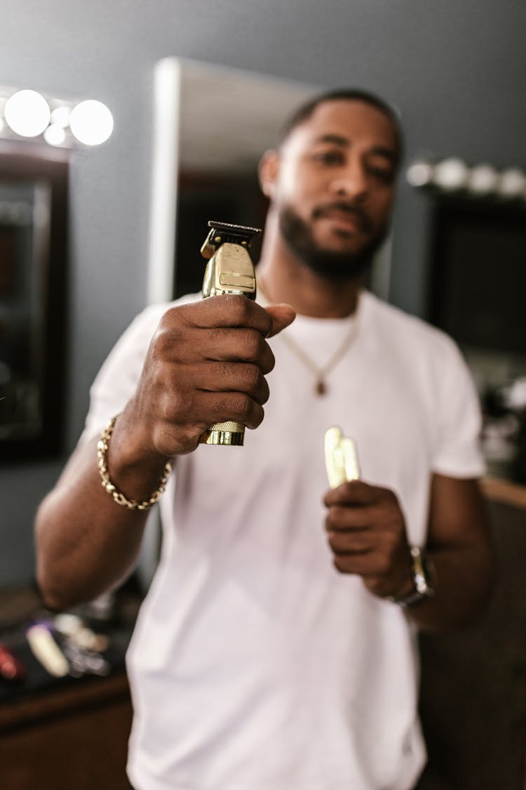 A Barber Holding Clippers