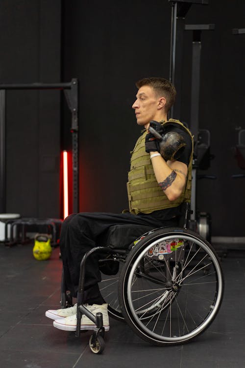 Free A Man Sitting on a Wheelchair  Stock Photo
