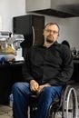 A Man in Black Long Sleeves Shirt Sitting on a Wheelchair